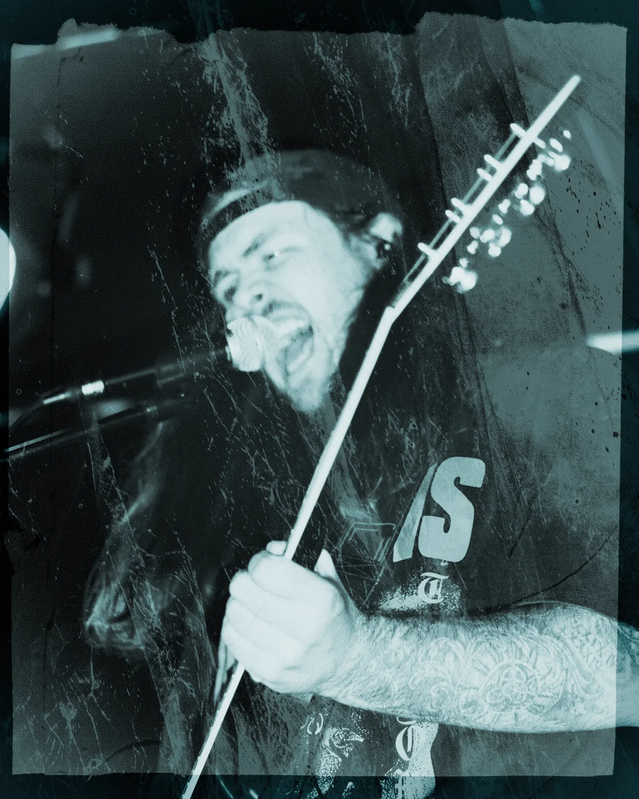 Cedar musician performing with guitar