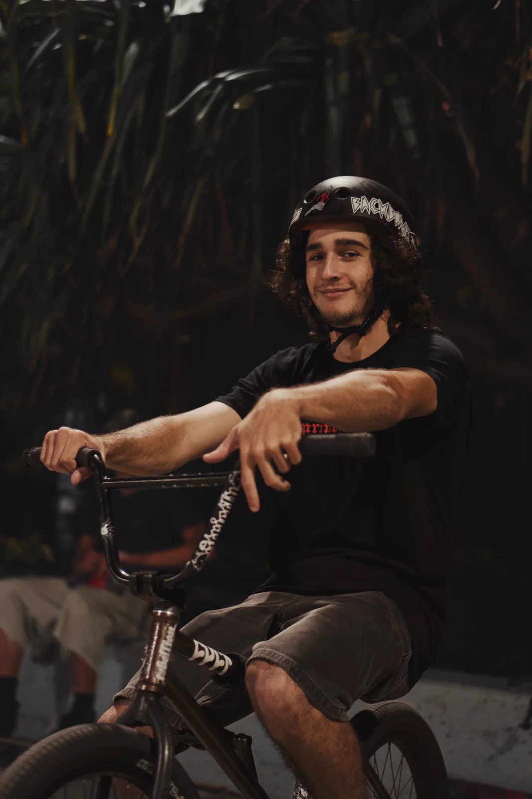 Lucas resting on his BMX between runs
