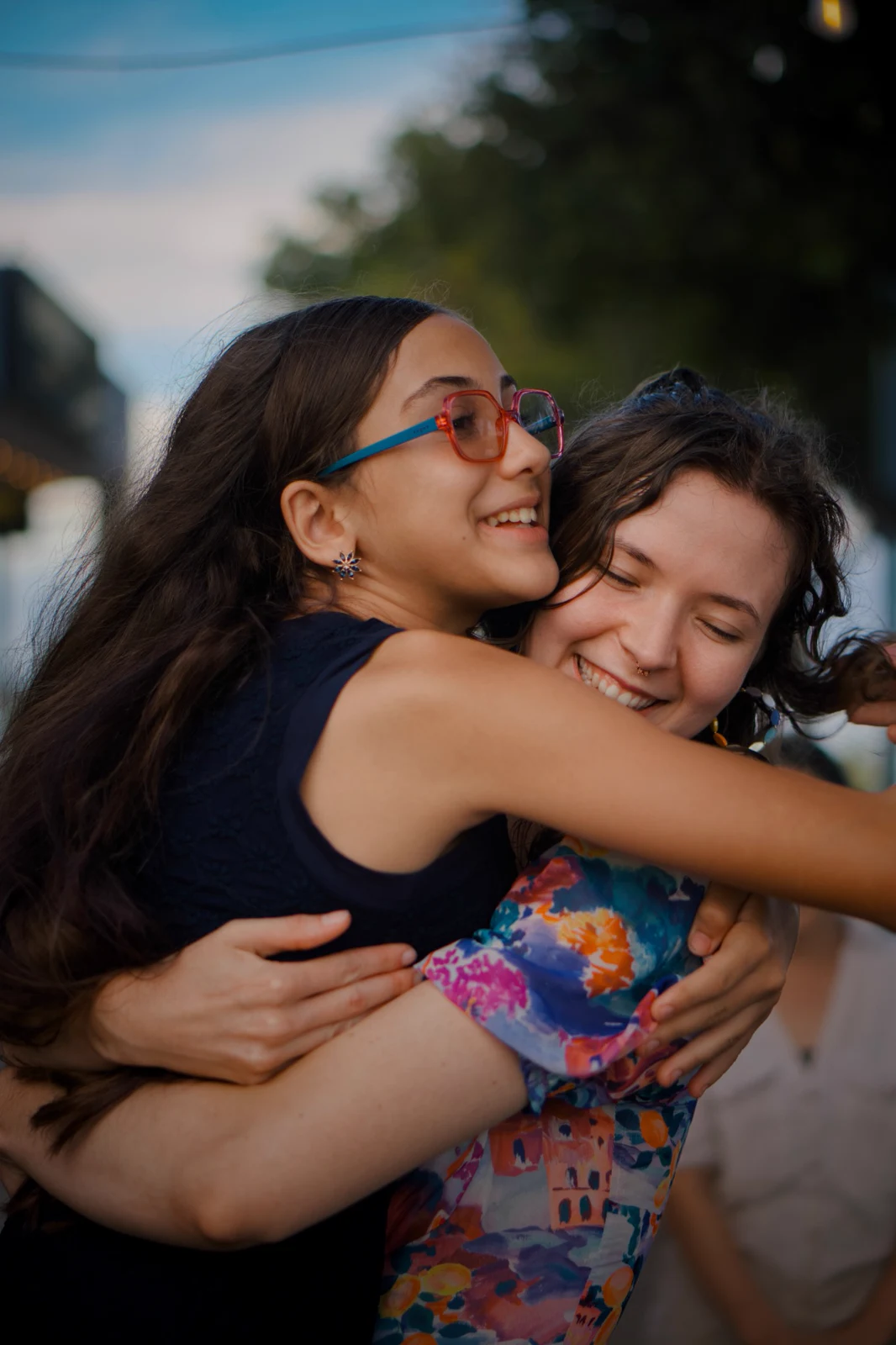 Guests sharing a joyful embrace